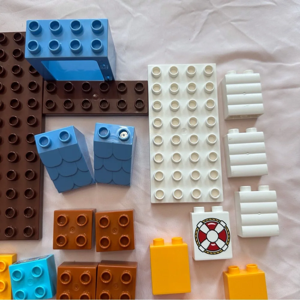Random assortment of building bricks blocks various colors &‎ sizes